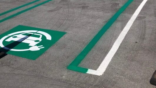 An Electric Car Section Sign on Parking Space
